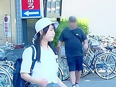 A man targets a girl in a uniform, groping her body and lifting her skirt to touch her buttocks.