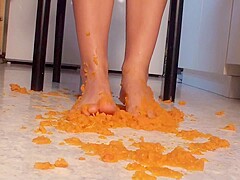 Close up of trampling food in the kitchen by Foot Girls