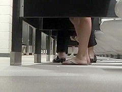 Foot fetish cam in busy public restroom