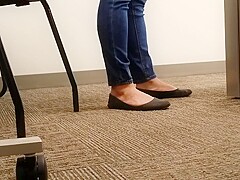 A Look At An Office Managers Well Worn Black Ballet Flats