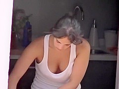 My smoking hot neighbor shows off her cleavage while cleaning
