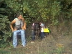 Real girls sat pissing outdoor and got voyeured on cam