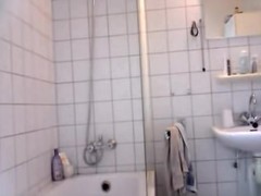 Tan lined ass and hairy cunt of hidden shower cam bimbo