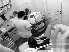Female patient exposes her hairy vagina at the gynecologist