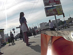 Nice upskirt view presents delicious young buttocks