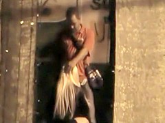 Leggy slut spied sucking dick in an alley