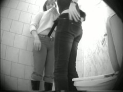 Two amateur girls in turns show asses pissing on toilet