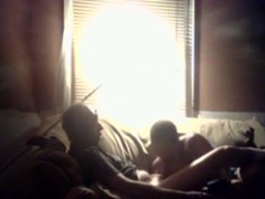 Black girl sucks andd jerks her white bf's cock on the sofa