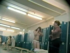 Mature changing and showing the naked big belly