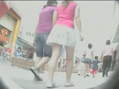Street voyeur shot up a girls white mini skirt