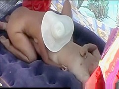 Couples having sexual moments at beach