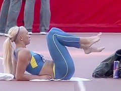 Sexy blonde athletic warming up