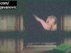 Spy Blonde Woman at the window