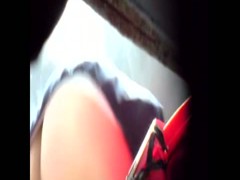Large ass woman takes a piss in a public bathroom stall porno vid