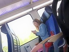 Guy wanks his cock in train next to girl