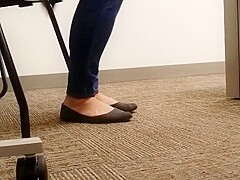 A Look At An Office Managers Well Worn Black Ballet Flats