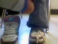Shoes And Socks Under The Desk At School
