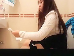 Long hair teen spied in bathroom pissing