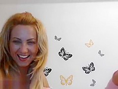 Sexy blonde SweetAndreea plays with rubber penis