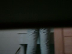 Peeing spy cam shot of a cute asian girl on a toilet