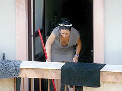 MILF tits downblouse on the balcony