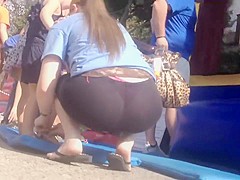 Milf's pink thong visible in public place