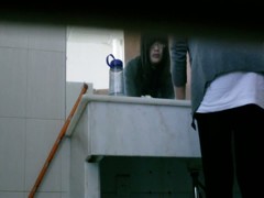 Hot video of an Asian chick pissing in the public toilet