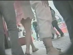 Two booty babes in a crowded shopping district upskirt porno
