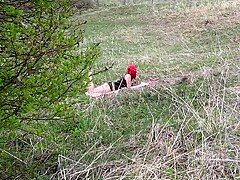 Voyeur spies on a girl with a big ass that masturbates outdoors. Organic masturbation with cucumber.