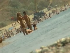 Sexy naked people in a beach spy voyeur video