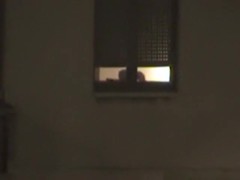 Voyeur tapes the neighbor girl having sex through her bedroom window