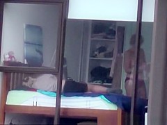 Mature spied through the hotel bedroom window