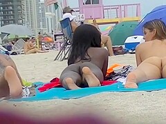 EXHIBITIONIST WIFE #98- HEATHER TAKES HER HUBBY HER GIRLFRIEND TO THE NUDE BEACH! VOYEUR POV