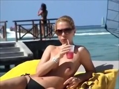 Barefaced Russian blondie likes to tan her body topless