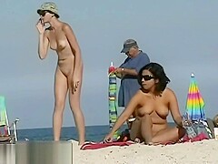 Stunning tanned babes are all over that nudist beach