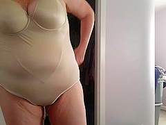 lotion on legs, fat pussy, big tits, girdle