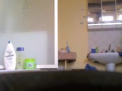 Milf with fatty belly and bushy cunt showering on spy cam