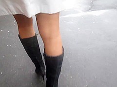 Black boots and tan stockings upskirt