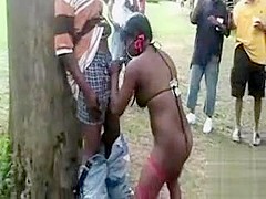 Black hookers make money on a day at the public park