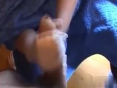 Tugjob wearing rubber gloves