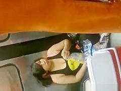 Busty girl in black top down blouse and cleavage