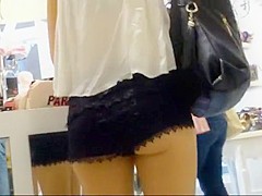 Ass cheeks falling out of lace shorts