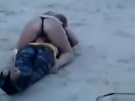 German chick jerks her new friend off at the beach