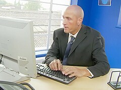 Big boobed babe fucks a bald bloke in his office