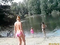 Sunny day at the nudist camp by the river