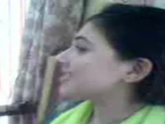 Adorable Pakistani wife kisses her fashionable spouse