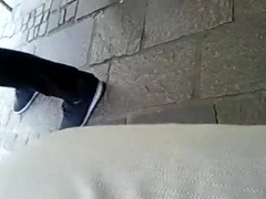 a little shoe dangling from a wonderful woman
