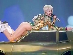 Miley Cyrus slideshow with erotic scenes in revealing outfits