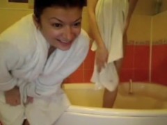 two lesbian girlfriends helping each other