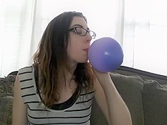 Sammy blows up a balloon with smoke then pops it